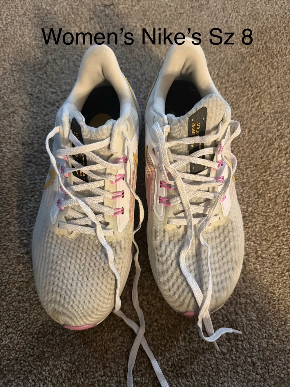 Nike Women’s Running Shoes in White with Pink Accents Sz 8. See all pics